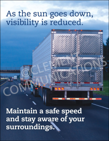 A workplace safety poster featuring a semi-truck driving on a highway at dusk. The text reads, "As the sun goes down, visibility is reduced. Maintain a safe speed and stay aware of your surroundings."