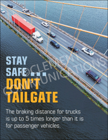 An aerial view of a suspension bridge with a red semi-truck and several cars traveling across it. Overlay text reads "STAY SAFE... DON'T TAILGATE" and notes that truck braking distance is up to 5 times longer than passenger vehicles.