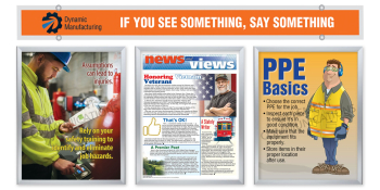 A display of the Dynamic Communication Program (DCP) showing a coordinated set of safety posters, large-scale banners, and employee newsletters for workplace safety.
